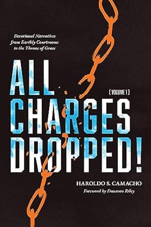 Paperback of "All Charges Dropped!" devotional book by 17 Publishing, featuring spiritual narratives from earthly courts to God's throne.
