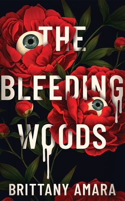 Paperback copy of The Bleeding Woods novel by 47north, featuring the book cover with dark, atmospheric artwork.