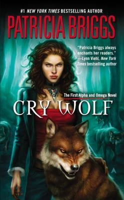 Paperback copy of Cry Wolf by Ace Books featuring the book's cover with dark wolf imagery and title text.
