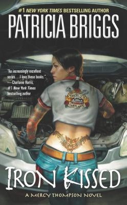 Paperback of "Iron Kissed" by Patricia Briggs, an urban fantasy novel published by Ace Books.