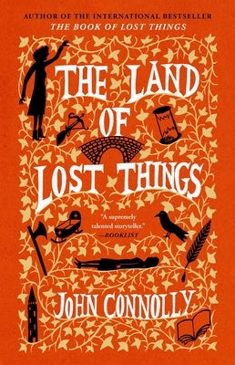 Paperback of "The Land of Lost Things" by Atria Books, showing the book cover with a mysterious landscape illustration.