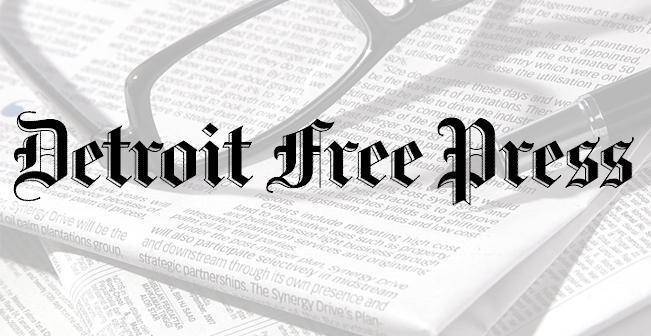 Detroit Free Press Sunday-only newspaper delivery for 12 weeks, showing a stack of newspapers and delivery details.