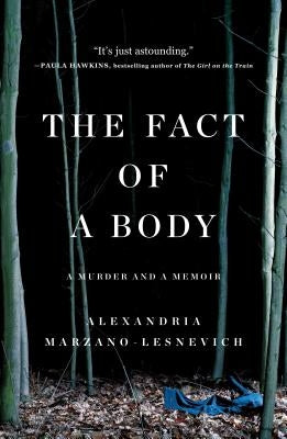 Paperback copy of "The Fact of a Body: A Murder and a Memoir" by Flatiron Books, showing the book cover with title and author.