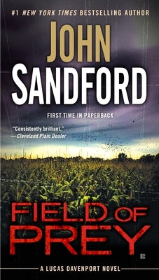 Mass market paperback of "Field of Prey" by G.P. Putnam's Sons, featuring the book cover with a descriptive design.