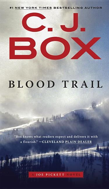 Paperback copy of "Blood Trail" by G.P. Putnam's Sons featuring the book's cover with dark, suspenseful artwork.