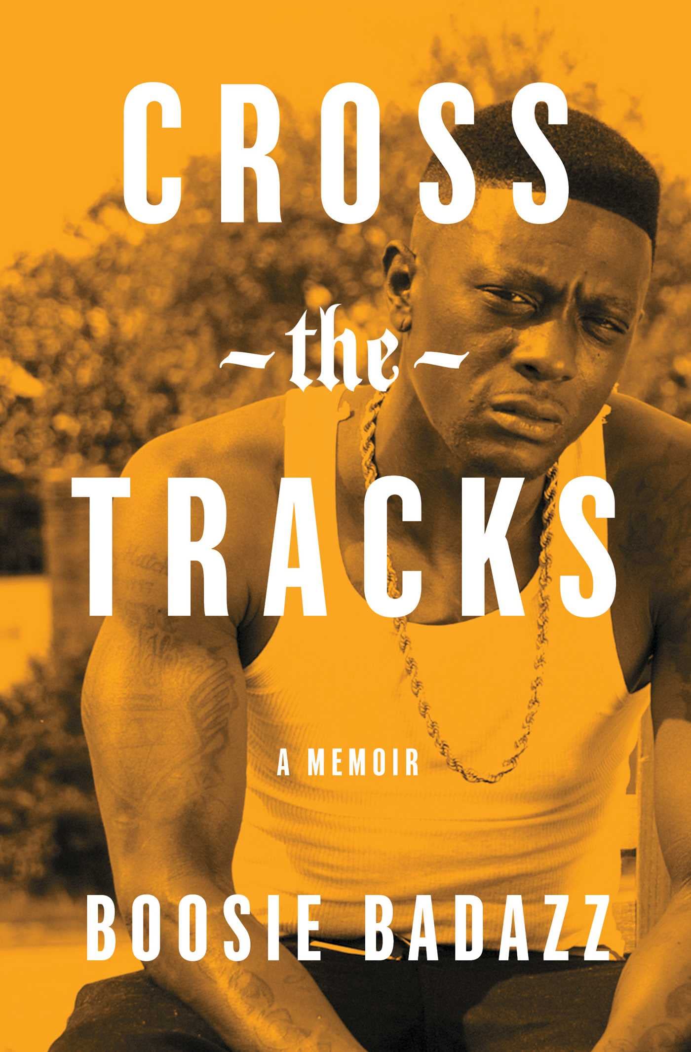 Paperback copy of "Cross the Tracks: A Memoir" by Gallery Books, with the book cover featuring the title and author.