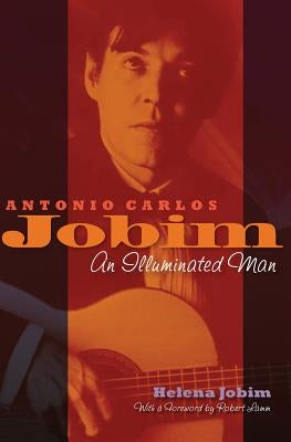Hardcover book "Antonio Carlos Jobim: An Illuminated Man" by Hal Leonard Publishing Corporation, featuring cover art and title.