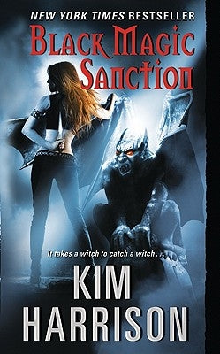 Paperback of Black Magic Sanction by Harper Voyager featuring dark mystical cover art and title text.