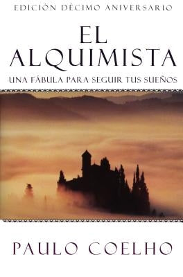 Paperback of The Alchemist El Alquimista Spanish edition by HarperCollins Espanol, featuring a colorful cover design.