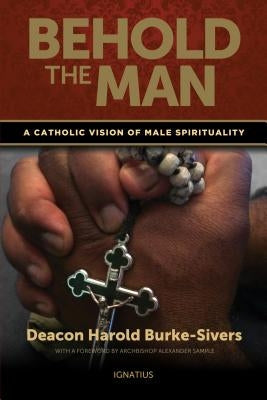 Paperback book titled "Behold the Man: A Catholic Vision of Male Spirituality" by Ignatius Press, featuring a cover with religious imagery.
