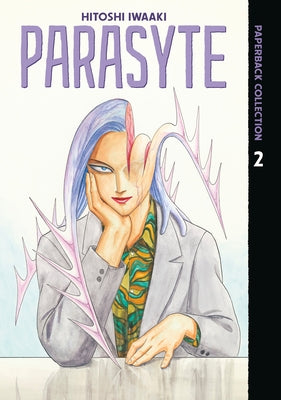 Paperback collection of Parasyte by Kodansha Comics, featuring manga cover art with creepy parasitic creature and Japanese artwork.