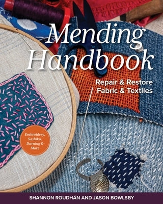 Paperback Mending Handbook by Stash Books showing colorful fabric patches and sewing tools for repairing textiles.