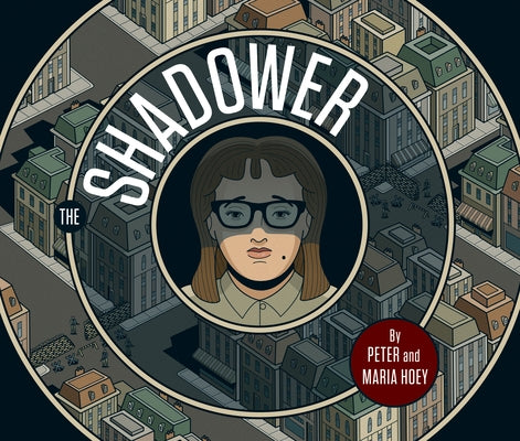 Paperback copy of The Shadower comic book by Top Shelf Productions showing the front cover with dark, shadowy artwork.