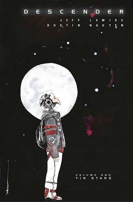 Paperback of Descender, Volume 1: Tin Stars comic book by Image Comics featuring colorful cover art and graphic illustrations.