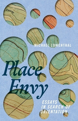 Paperback copy of Place Envy: Essays in Search of Orientation by Mad Creek Books, showing the front cover with title and design.