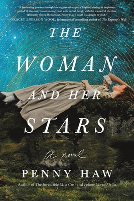Paperback of The Woman and Her Stars by Sourcebooks Landmark, showing the book cover with celestial artwork and title.
