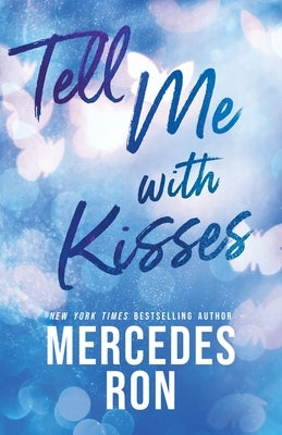 Paperback of "Tell Me with Kisses" by Bloom Books featuring a colorful cover with illustrations and romantic imagery.