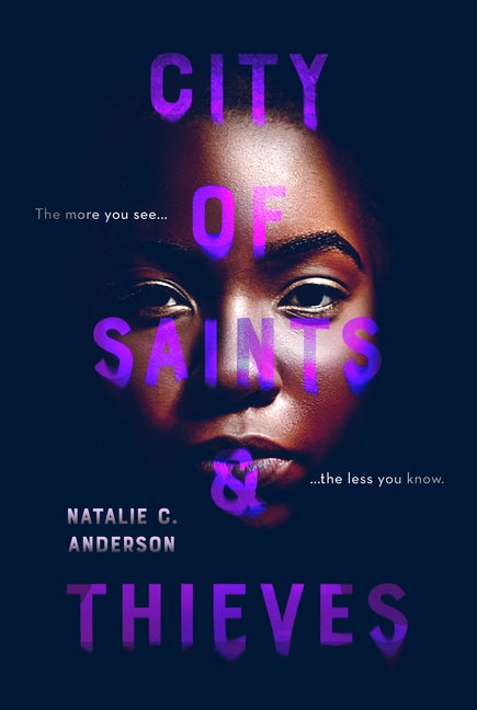 Paperback of City of Saints & Thieves by Penguin Young Readers Group, showing the book cover with vibrant artwork.