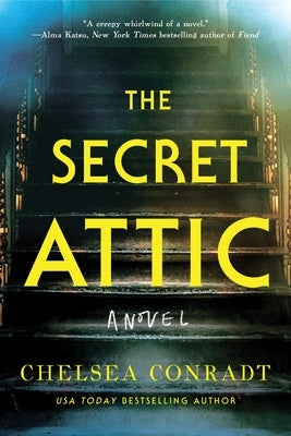 Paperback of The Secret Attic by Poisoned Pen Press featuring the book cover with title and author details.