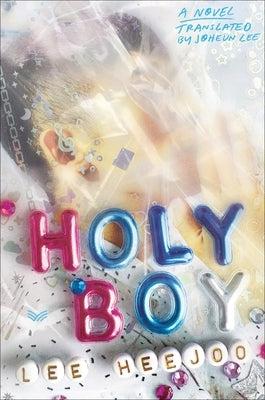 Paperback of "Holy Boy" by Harpervia featuring a close-up of the book cover with artistic design and title text.