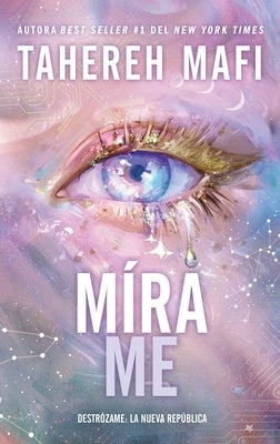 Paperback of "Mírame" by Urano World, featuring the book's cover with colorful artwork and title text visible.
