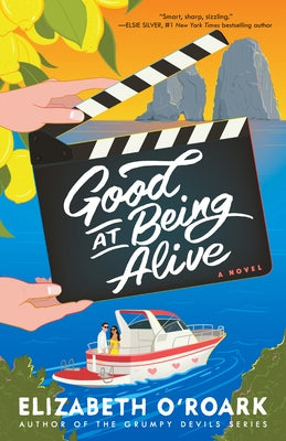 Paperback of "Good at Being Alive" by Dell, featuring a close-up of the book cover with title and author details.