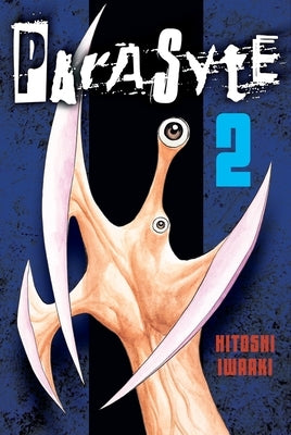 Paperback copy of Parasyte 2 manga by Kodansha Comics, featuring cover art with characters from the series.