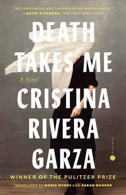 Paperback of "Death Takes Me" by Hogarth Press, showing the book cover with dark, moody artwork and title text.