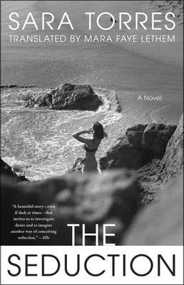 Paperback of "The Seduction" by Atria/Primero Sueno Press, featuring the book cover with title and author details.