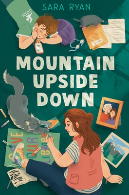 Paperback copy of Mountain Upside Down by Dutton Books for Young Readers, showing cover art with mountain scenery and title text.