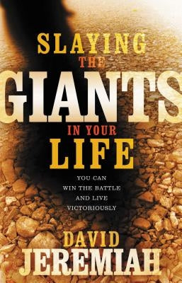 Paperback book titled "Slaying the Giants in Your Life" by Thomas Nelson, featuring a cover with inspirational design and bold text.