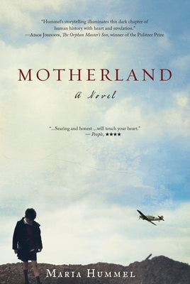 Paperback book "Motherland" by Counterpoint LLC, featuring a colorful cover design and visible spine on a wooden surface.