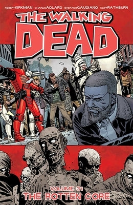 Paperback of The Walking Dead Volume 31: The Rotten Core by Image Comics, featuring cover art with zombie and survivor illustrations.