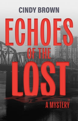 Paperback copy of "Echoes of the Lost: A Mystery" by Ooligan Press, featuring the book cover with mysterious artwork.