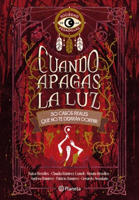 Paperback book titled "Cuando Apagas La Luz" with dark cover featuring eerie imagery, by Planeta Publishing.