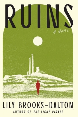 Paperback of "Ruins" by Grand Central Publishing, featuring the book cover with dark, atmospheric artwork.