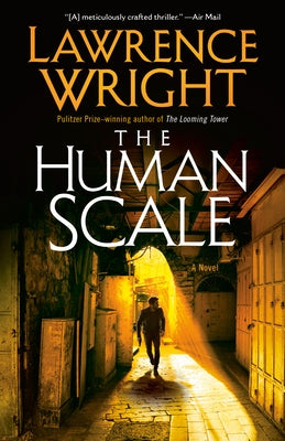 Paperback copy of "The Human Scale" by Vintage, featuring the book cover with title and author details.
