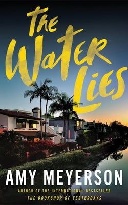 Paperback of "The Water Lies" by Thomas & Mercer featuring a cover with dark water and mysterious imagery.