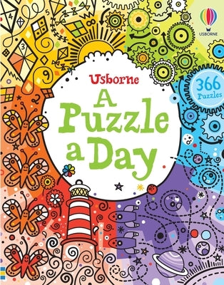 Paperback puzzle book titled "Puzzle a Day" by Usborne Books with colorful cover illustrations.
