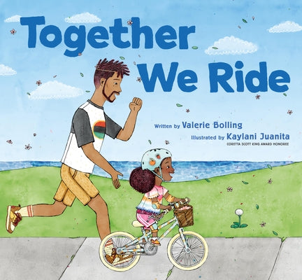 Paperback book titled "Together We Ride" by Chronicle Books, featuring colorful cover art with a bicycle and diverse group of riders.