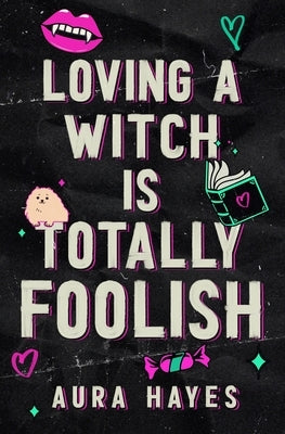 Paperback of Loving a Witch is Totally Foolish: Deluxe Edition by Aura Hayes, featuring colorful cover art with a mystical theme.