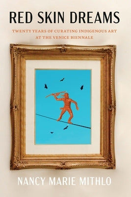Red paperback book titled "Skin Dreams: Twenty Years of Curating Indigenous Art at the Venice Biennale" by University of Nebraska Press.