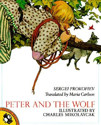 Paperback copy of "Peter and the Wolf" by Puffin Books featuring colorful illustrated cover art.