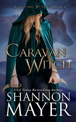 Paperback copy of Caravan Witch by Independently Published, showing the book cover with dark mystical artwork.