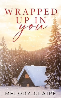 Paperback novel "Wrapped Up In You" by Melody Claire, featuring a cover with warm, cozy design and inviting typography.