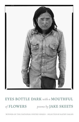 Paperback poetry book titled "Eyes Bottle Dark with a Mouthful of Flowers" by Milkweed Editions, featuring floral-themed cover art.