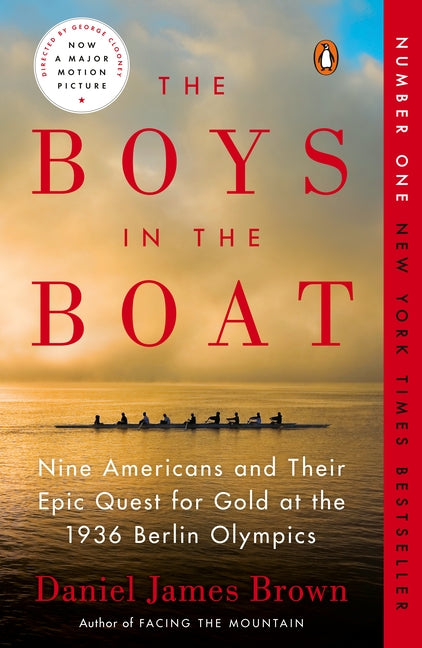 Paperback book titled "The Boys in the Boat" by Penguin Publishing Group, featuring a cover image with a rowing scene.