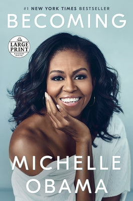Paperback of "Becoming" by Michelle Obama, published by Random House Large Print Publishing, showing the book cover with title and author.