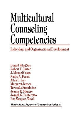 Paperback book titled "Multicultural Counseling Competencies" by Sage Publications, showing the front cover with colorful design.