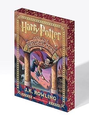 Harry Potter and the Sorcerer's Stone book by Scholastic Inc., featuring stenciled edges and a fantasy fiction cover.